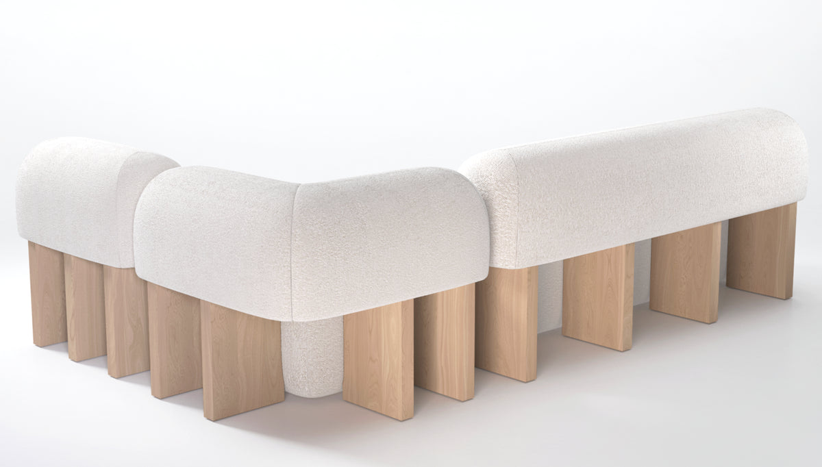 Ivory boucle modular bench on light oak supports