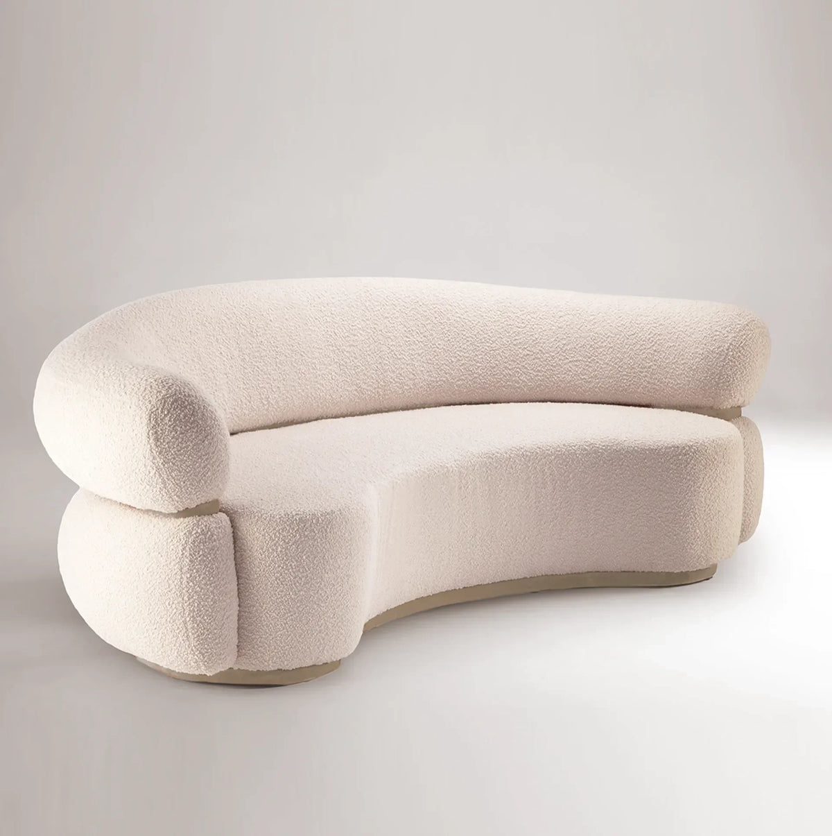 Malibu Curved Sofa in cream boucle by Maison Burgos