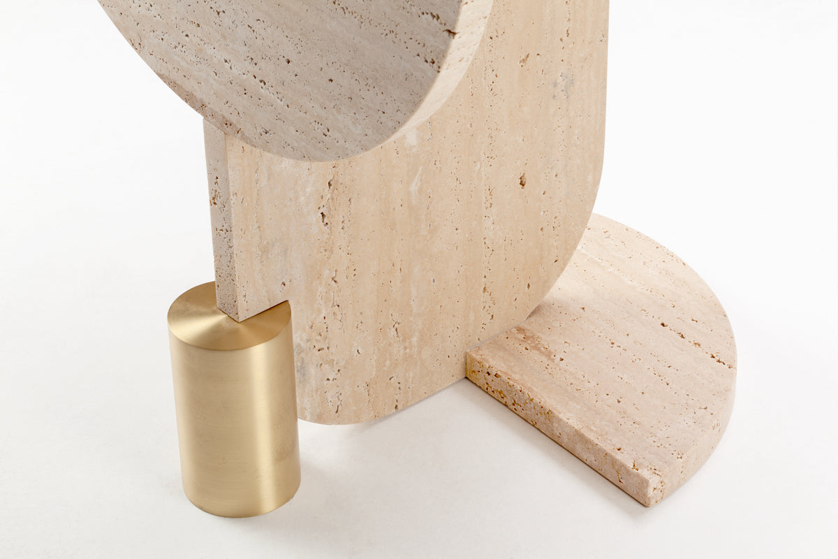 Playing Games Travertine Side Table close-up of the brass cylinder and travertine base