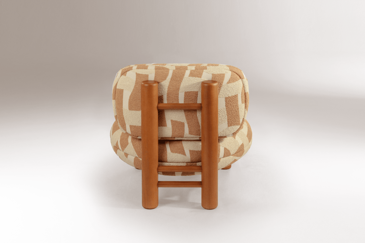 Aimi Lounge Chair in cream and terracotta pattern, back view of the wood ladder frame