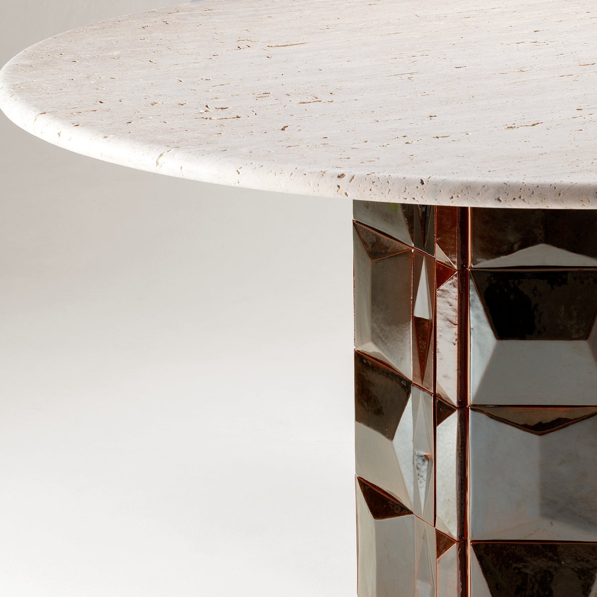 Milano Dining Table close-up of the Travertine top edge over the tile base