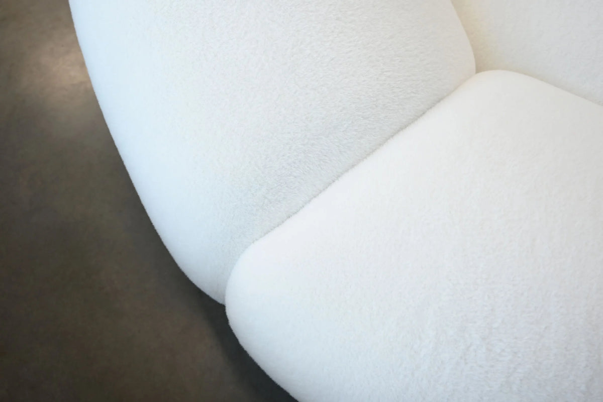Cirro Sofa in Polar White, close-up of rounded arm and seat