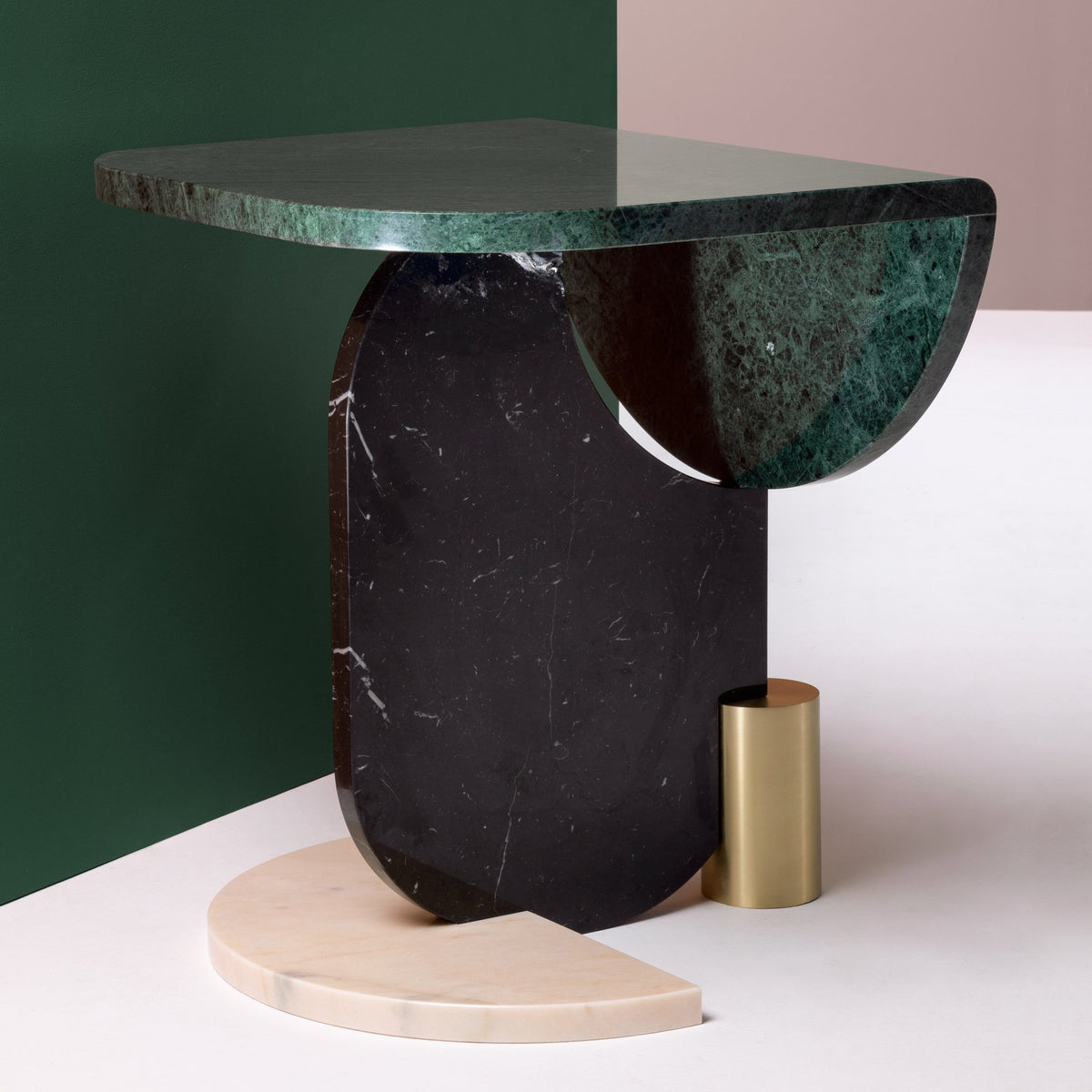 Playing Games Side Table in marble against green and pink walls
