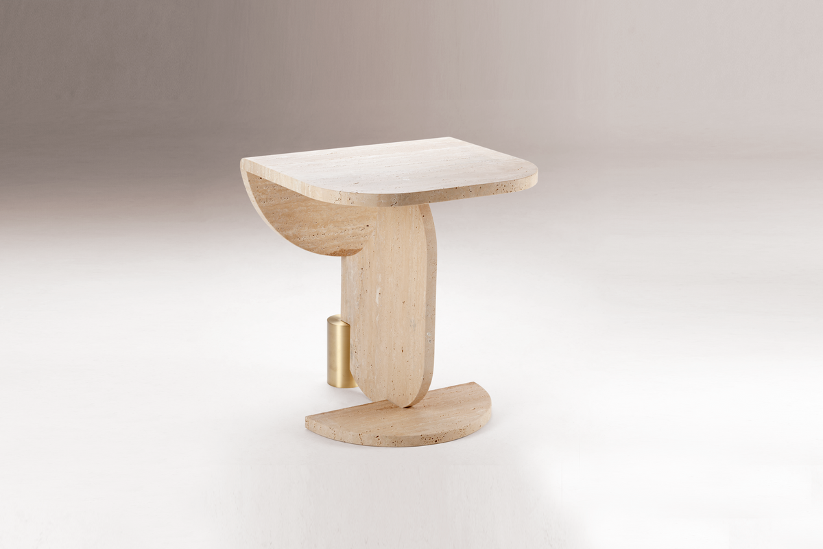 Playing Games Travertine Side Table on a grey backdrop, front view