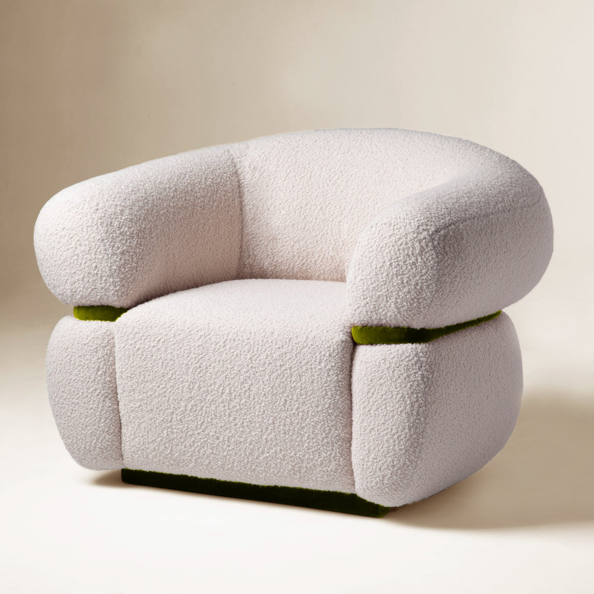 Malibu Armchair in ivory Bouclé with green velvet accent, front three-quarter view