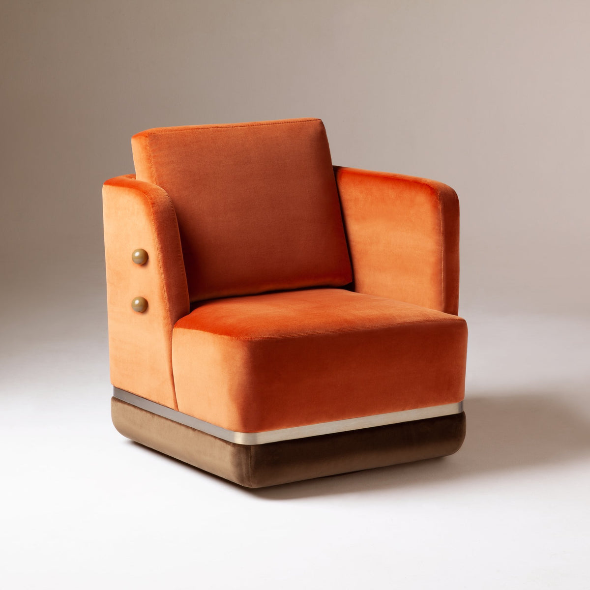 Panorama Armchair in orange velvet with bronze base and amber buttons, three-quarter view