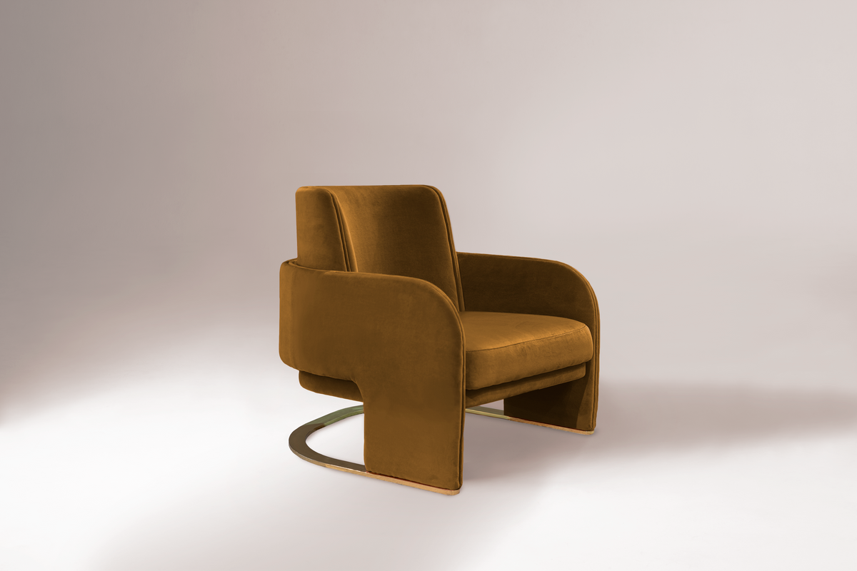Odisseia Armchair in ochre velvet, studio three-quarter view