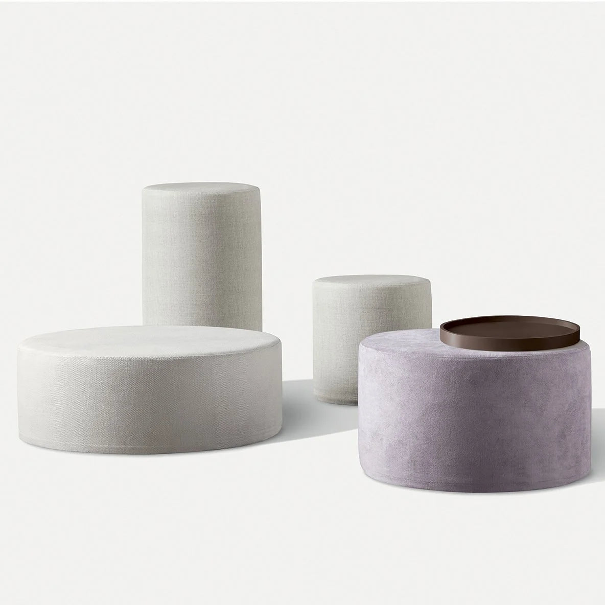 Muffin Pouf group in grey and lilac with a bronze tray top
