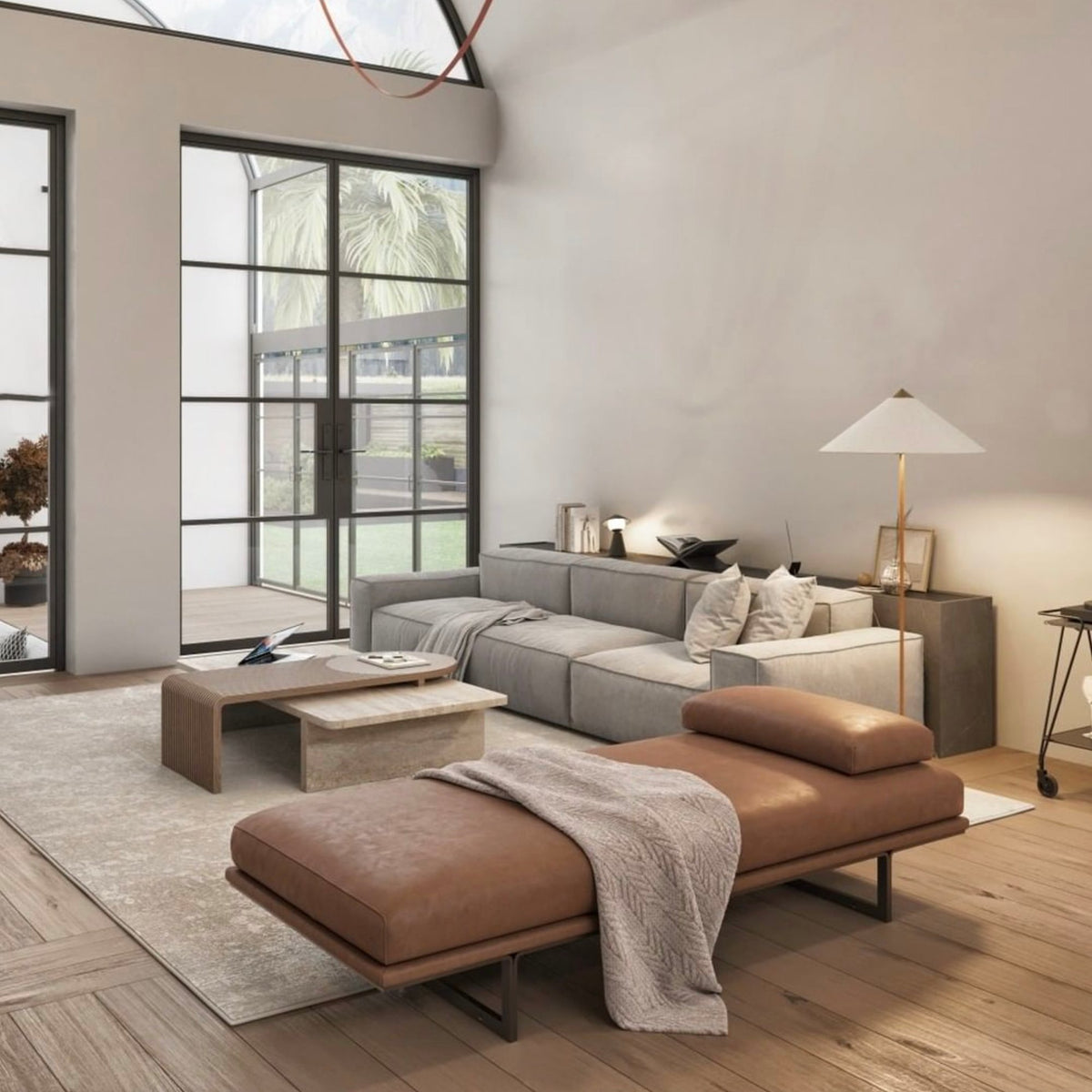 Stick and Stone Coffee Table in a loft living room with leather daybed