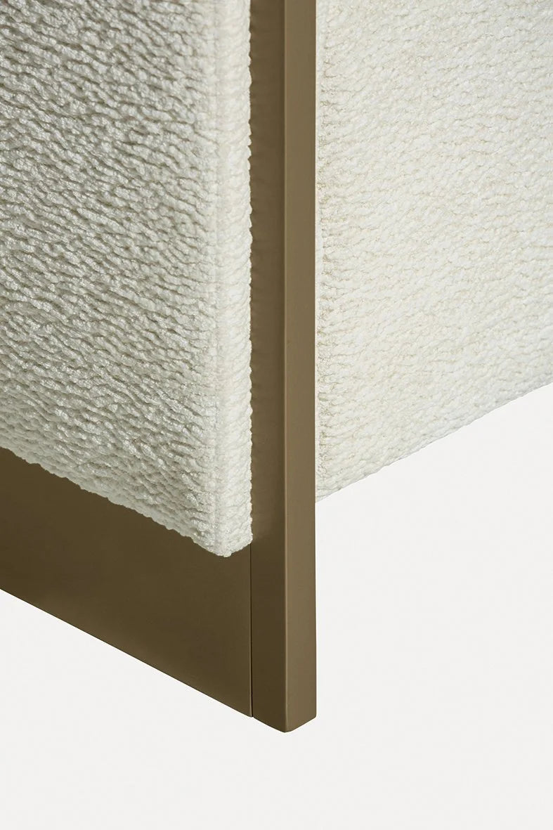 Adeline Armchair close-up of bouclé texture and bronze edge trim