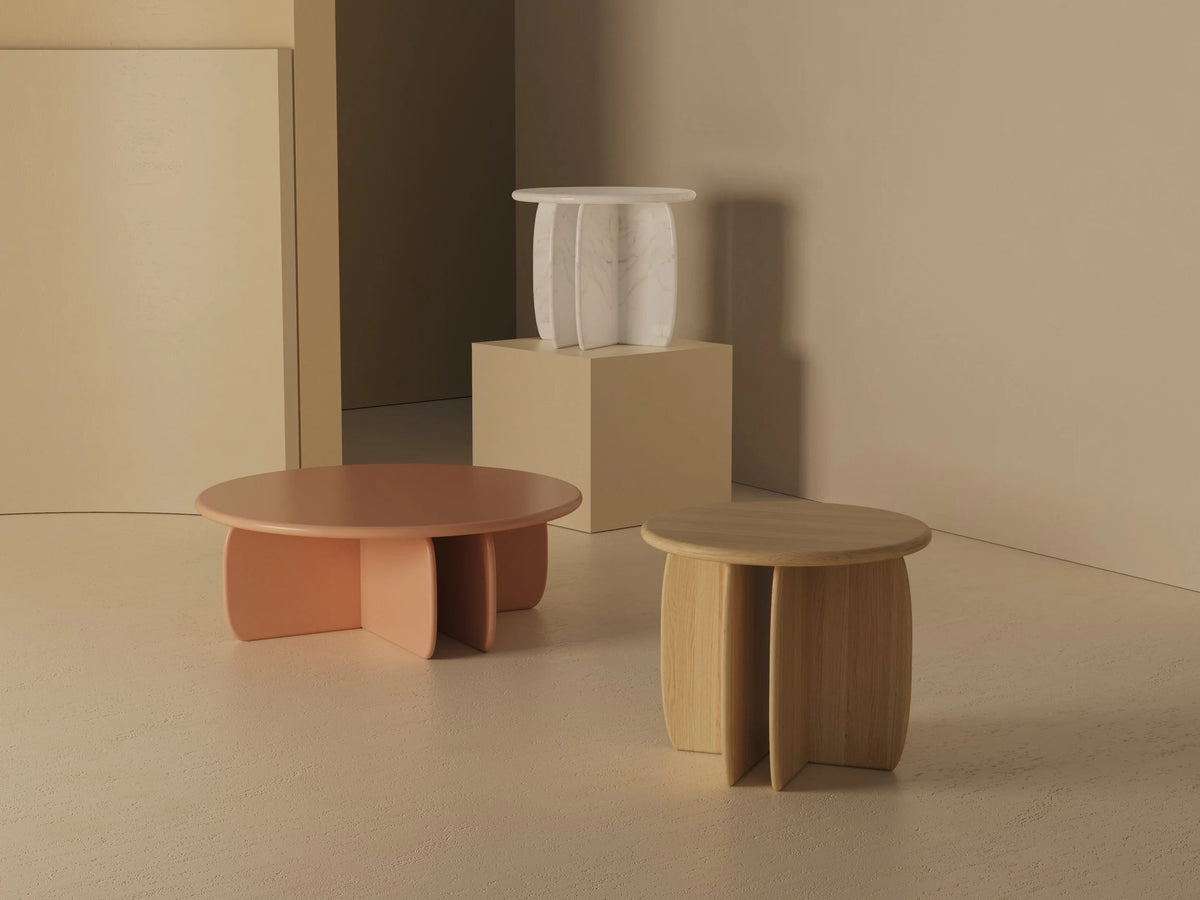 Catus Side Table - Outdoor with matching tables in pink, wood and white in a beige room