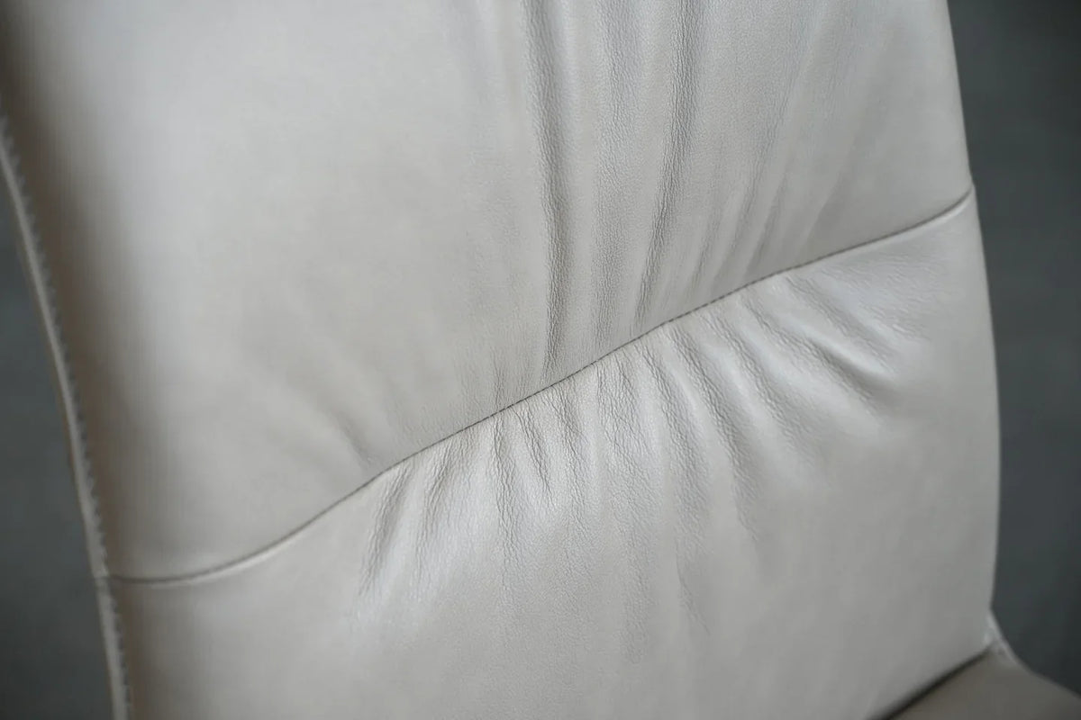 Close-up of Holt chair backrest with gathered leather detail