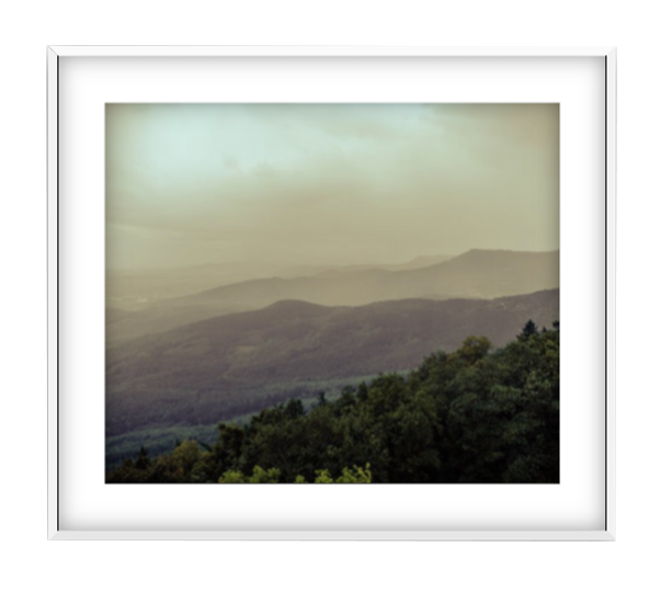 Vallée photographic print of misty layered mountains in a white frame