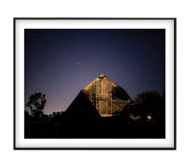 Grange photographic print of a barn under a starry night sky in a black frame