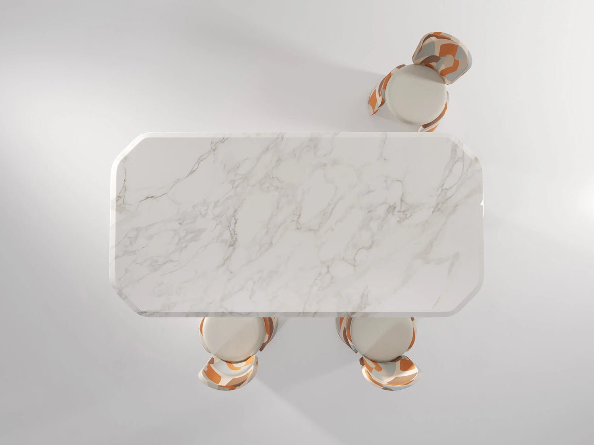 Inge Marble Dining Table top view of the white marble top with three chairs