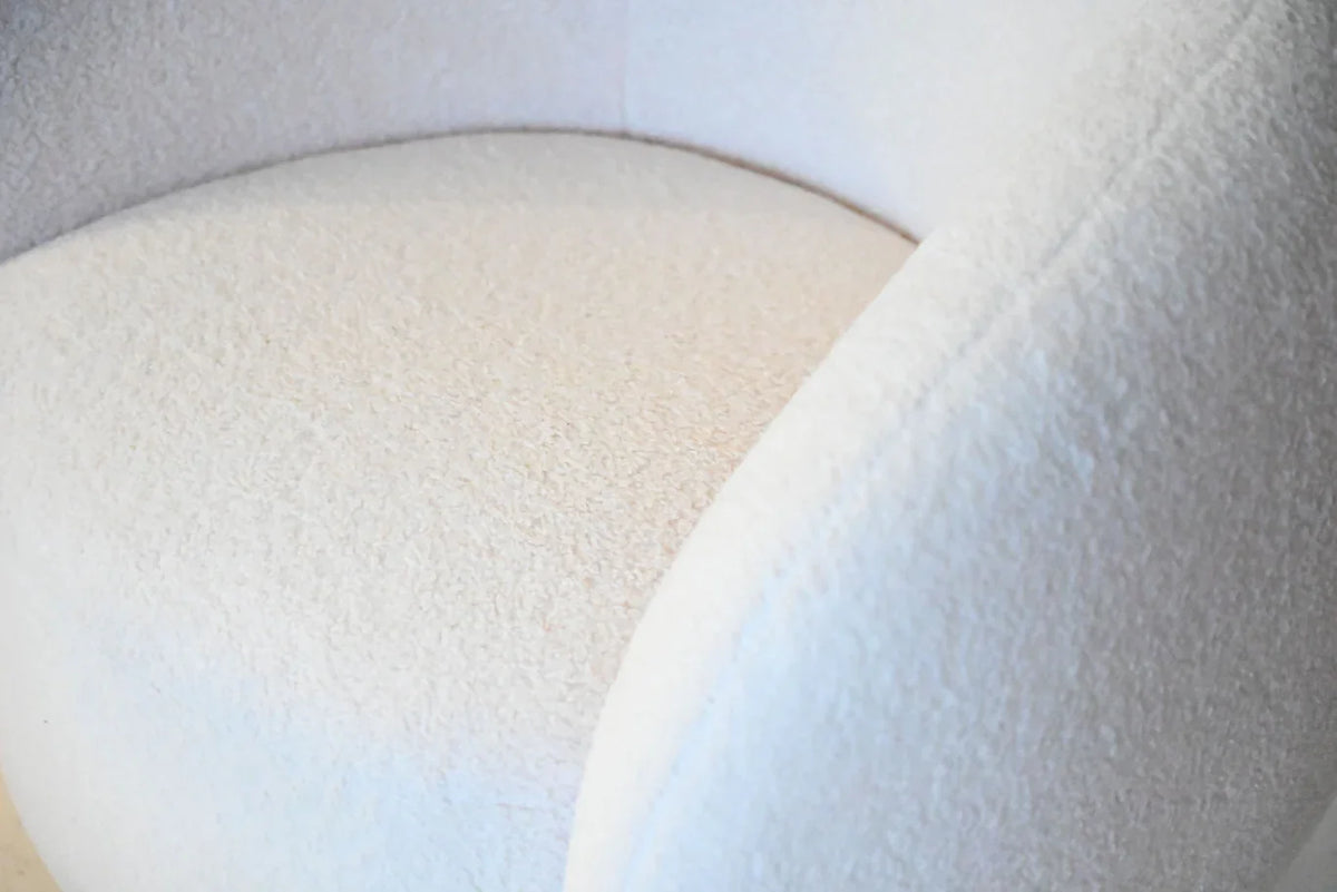 Dune Swivel Lounge Chair in Cream Teddy, close-up of the teddy fabric seat