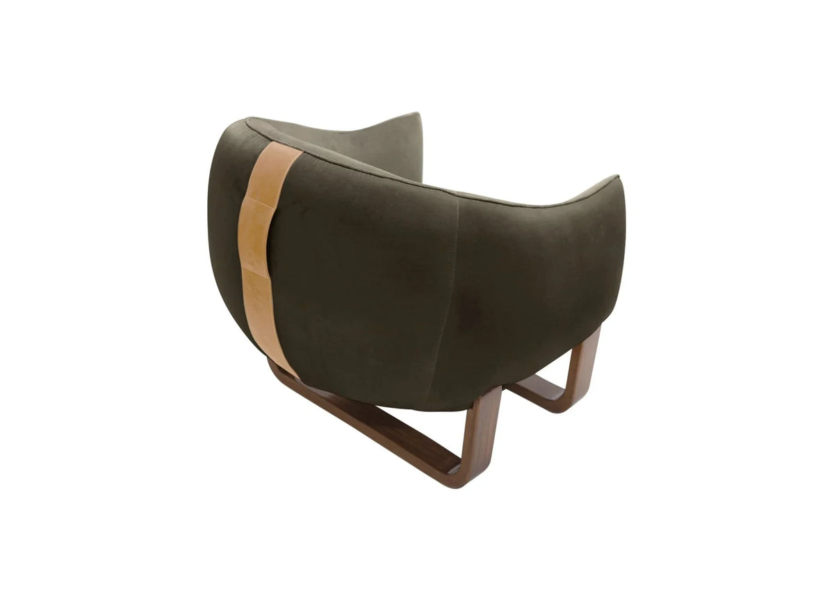 Milo Armchair back view in dark olive velvet with tan leather strap