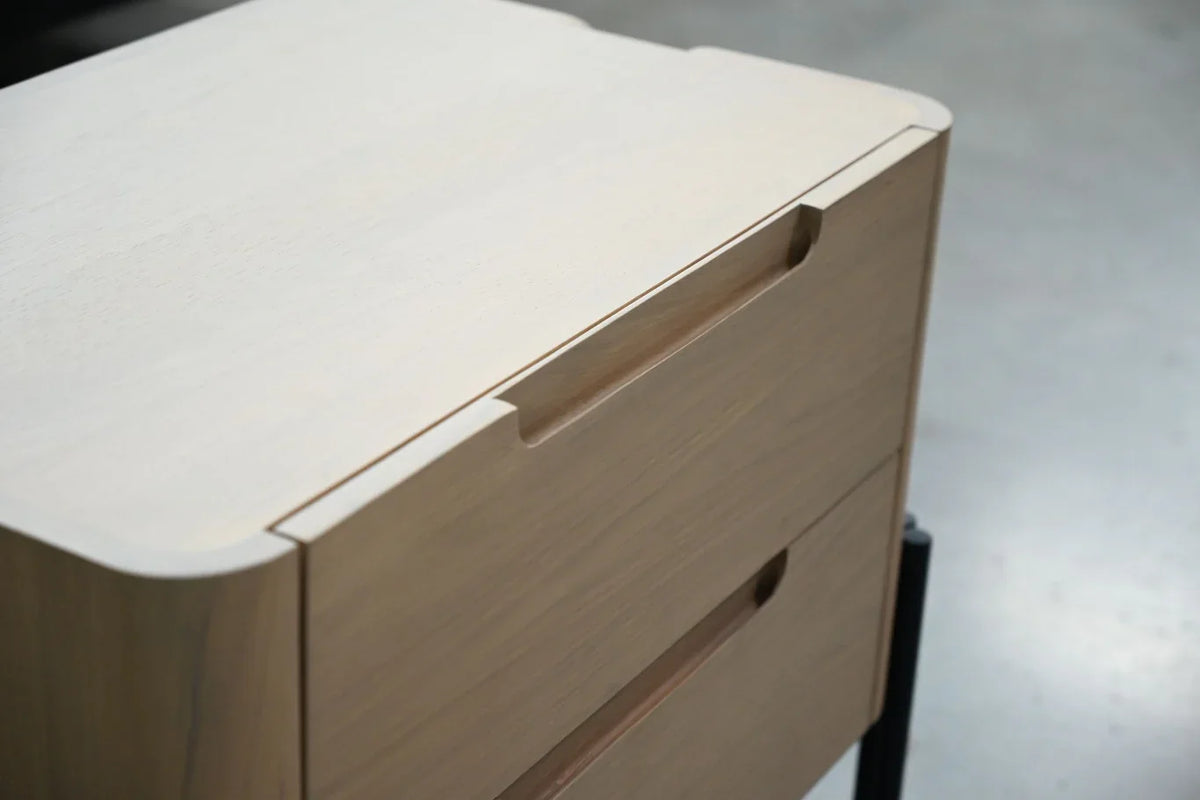Close-up of Nori Night Table drawer pull and rounded oak edges