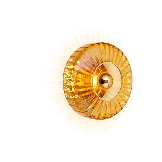 New Wave Optic Wall Sconce in amber glass, side angle showing the ribbed edge