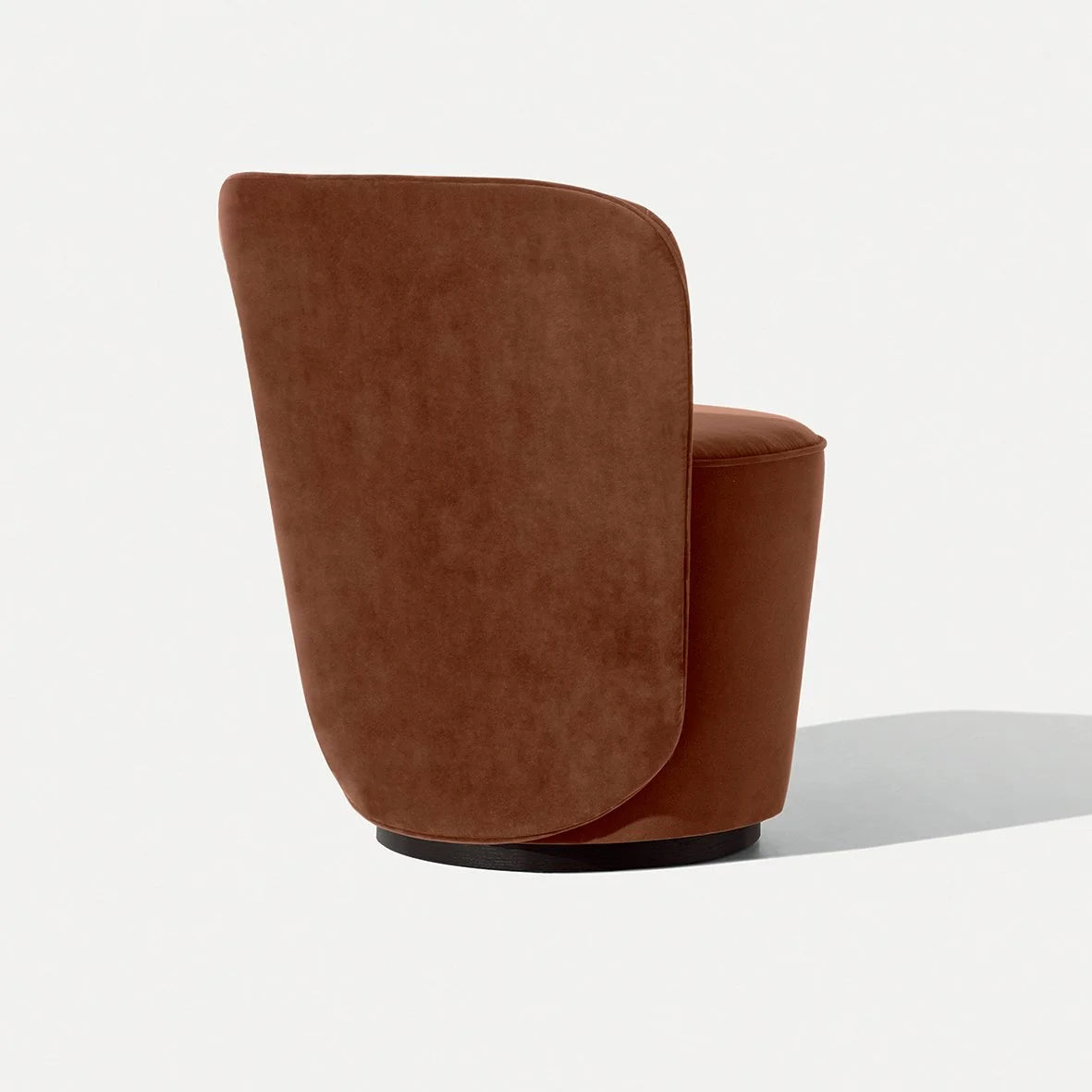 Opera Armchair in rust brown leather, rear three-quarter view of the wrap back