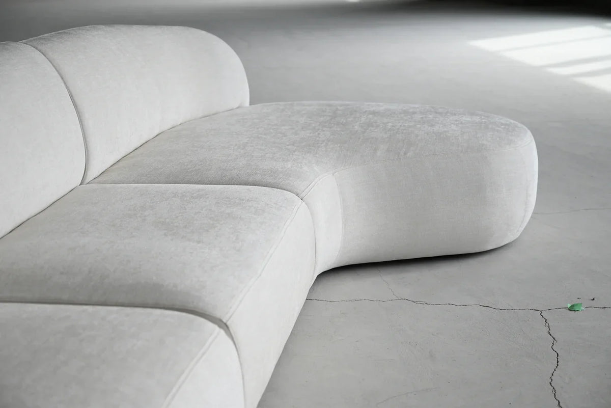 Moritz 3-Piece Sectional in Alabaster Boucle, close-up of the curved chaise end