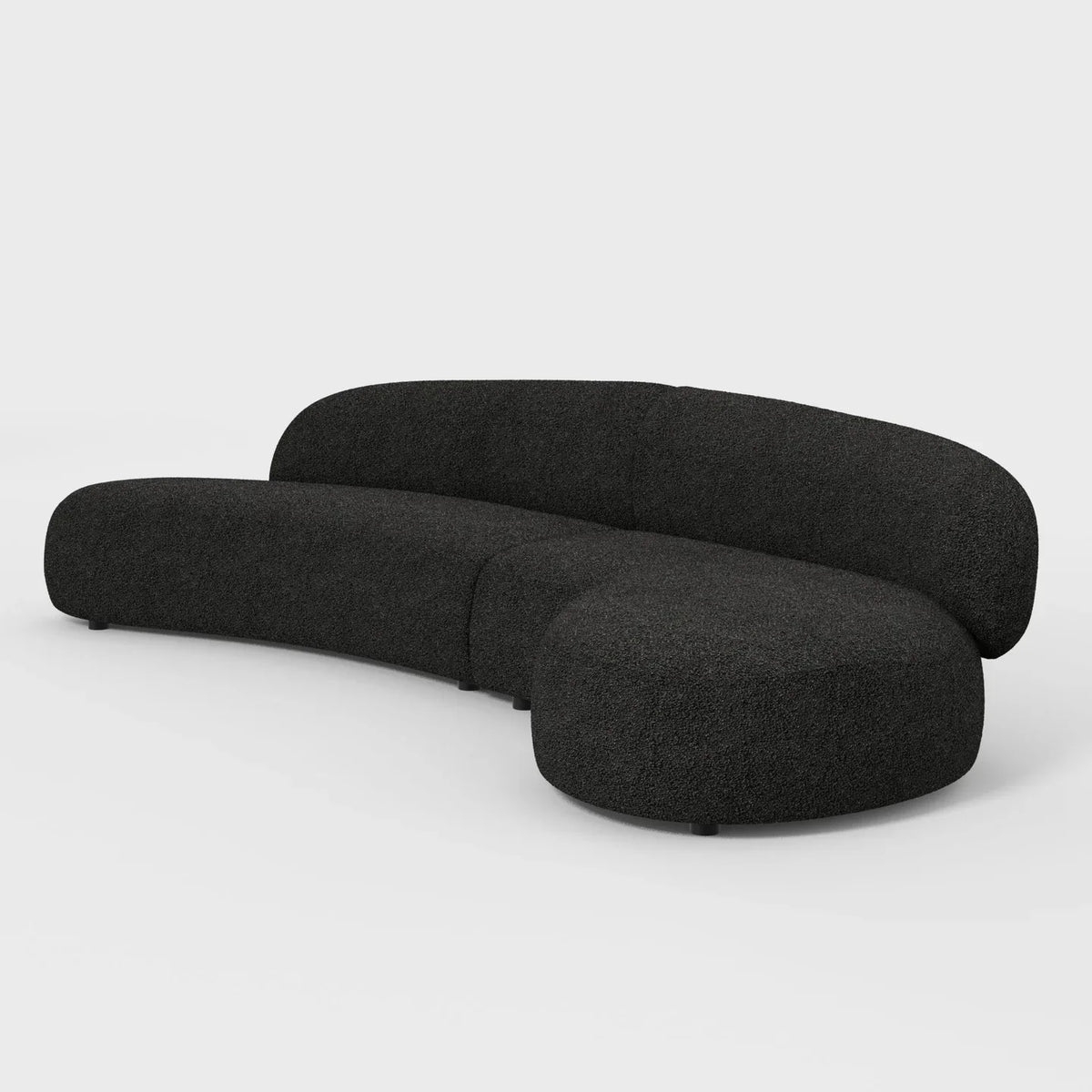 Moritz Sectional 2-Piece in Licorice Boucle, three-quarter view showing the curved chaise