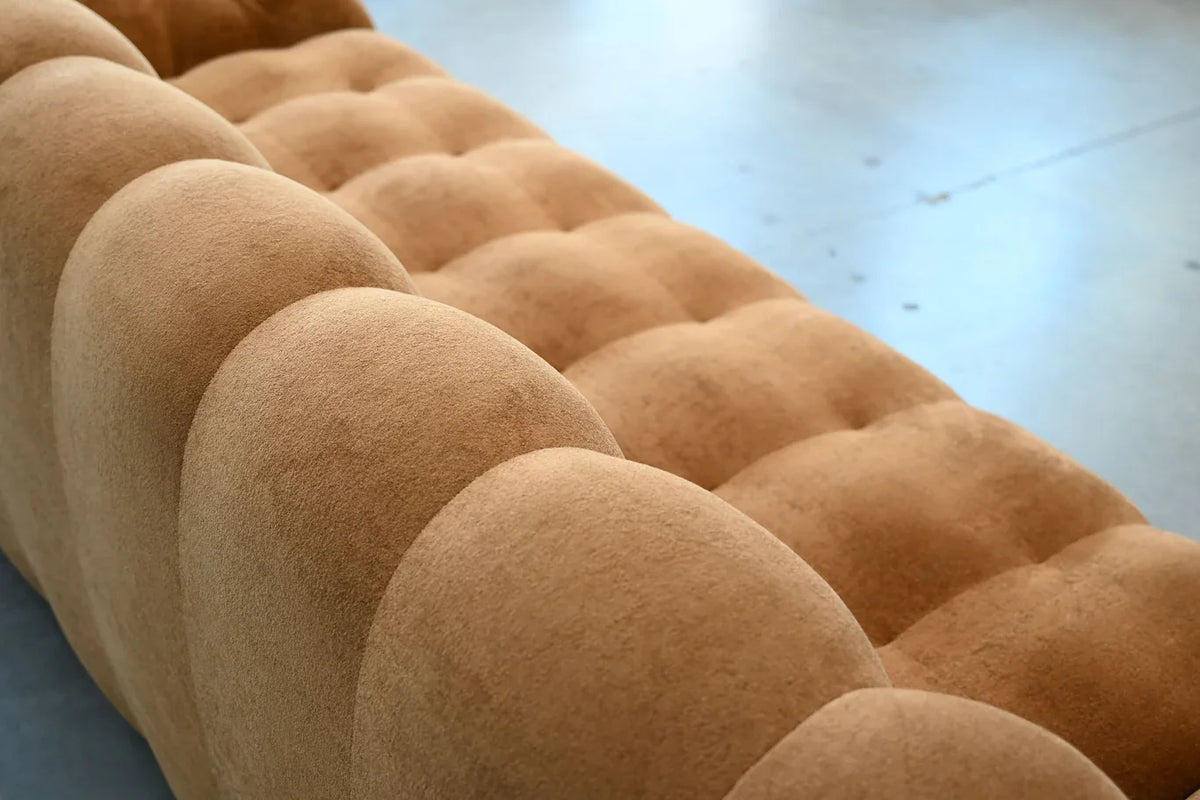 Puffin Sofa close-up of tufted toffee chenille seat channels
