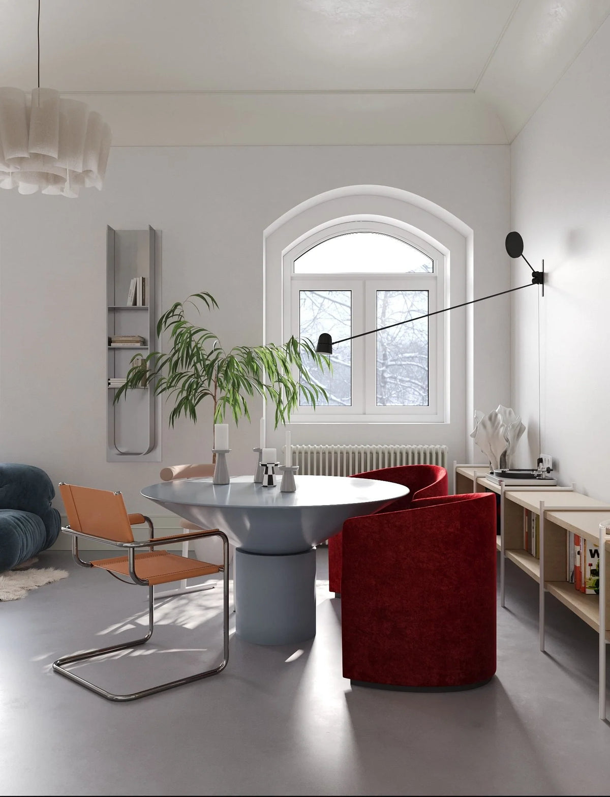 Silo Dining Table in grey lacquer with red velvet and leather chairs by an arched window