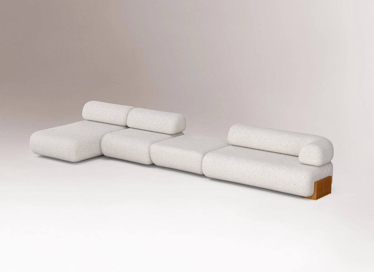 Carmel Modular Sofa - 4 Piece in ivory with bolster backs, three-quarter view