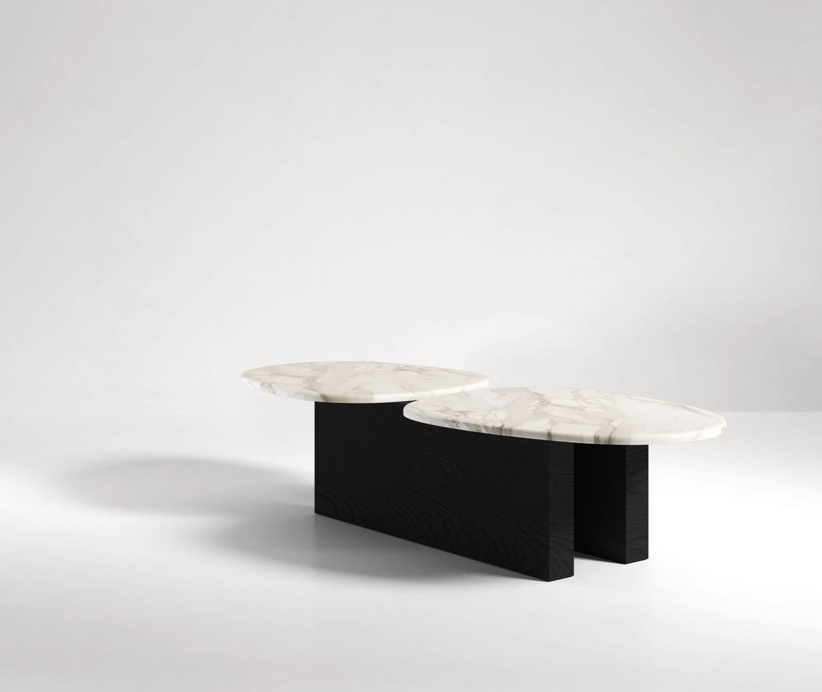 Taras Coffee Table with white marble tops on a black-stained base, three-quarter view