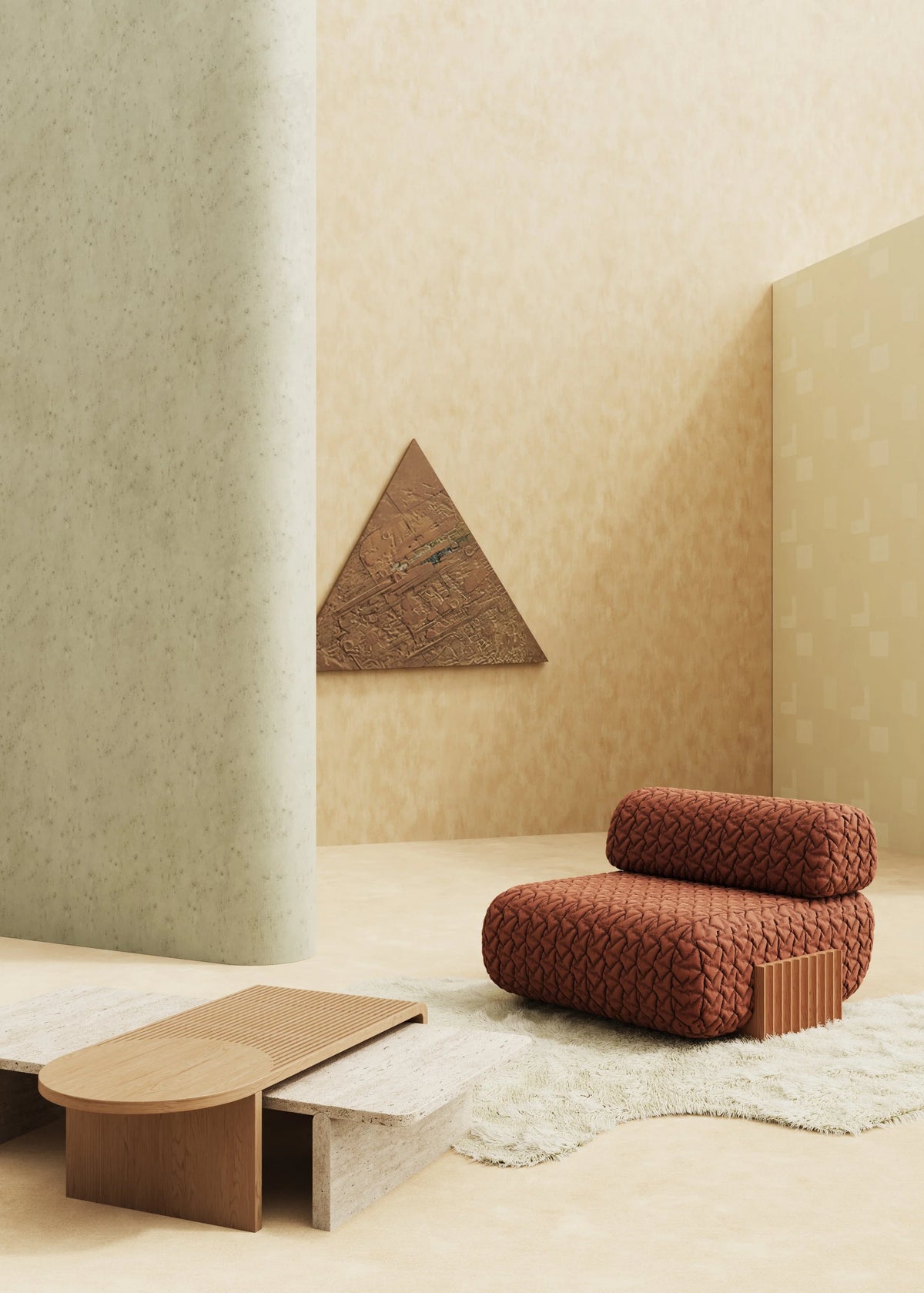 Carmel Chaise Lounge in rust weave beside a low travertine table in a beige room