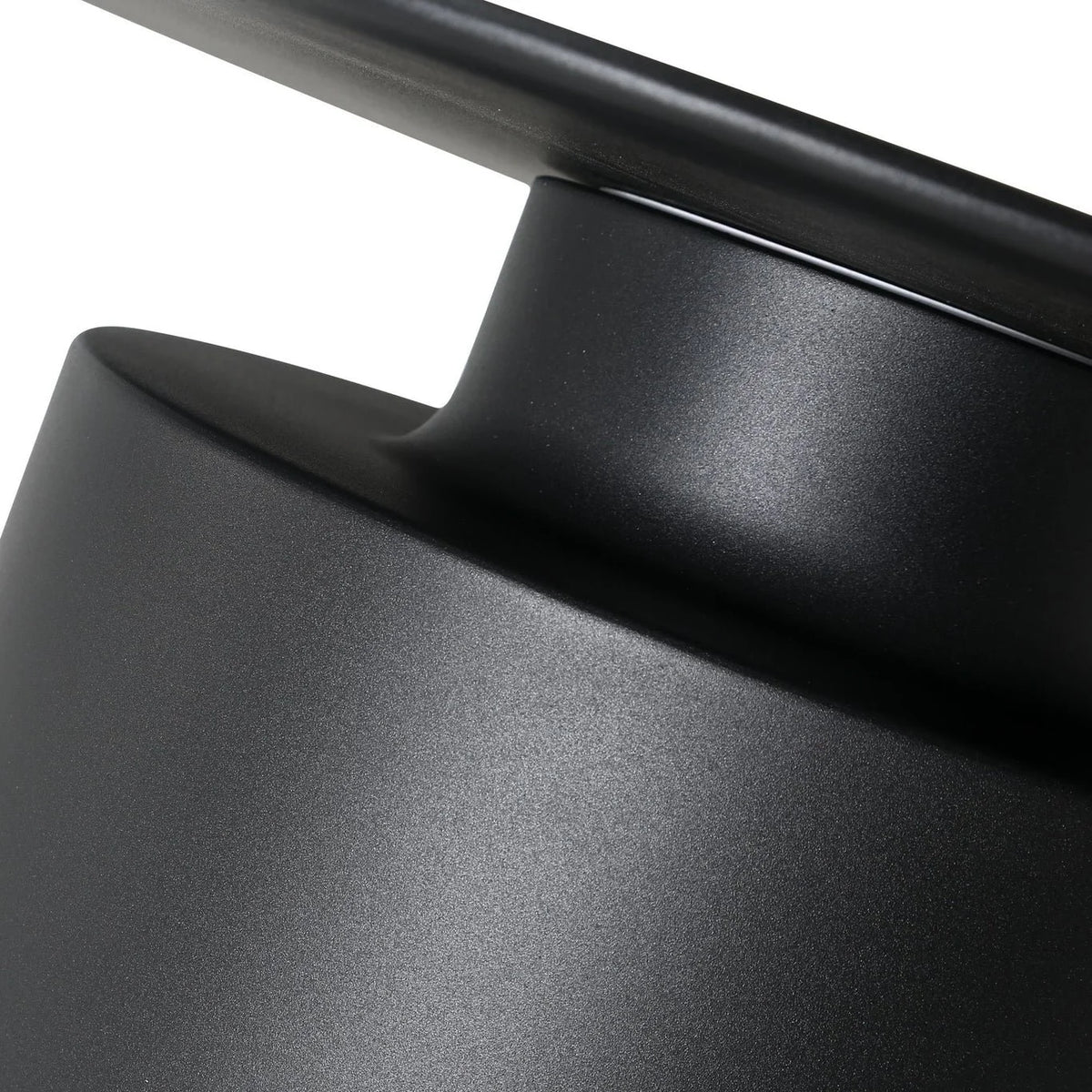 Rook Coffee Table in Matte Black, close-up of tray top and drum base