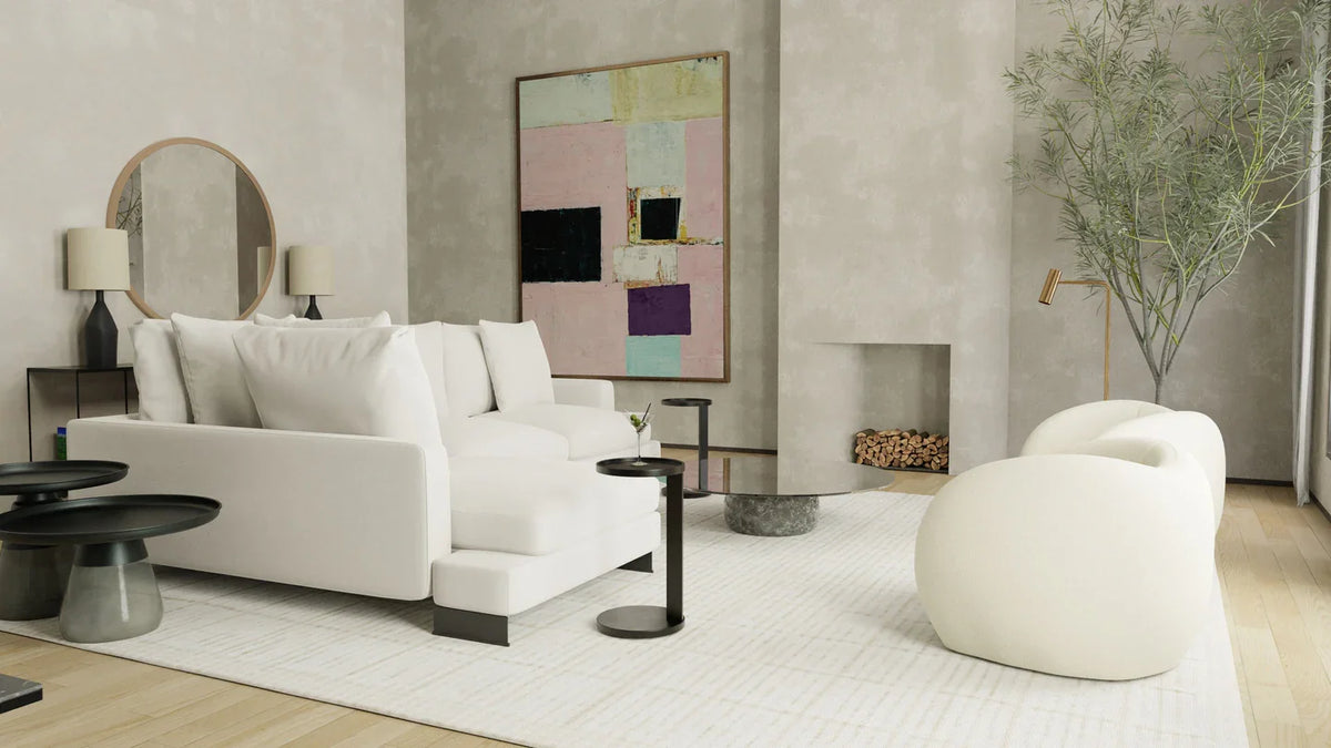 Rookie End Table in Matte Black in a living room with a cream sofa and artwork