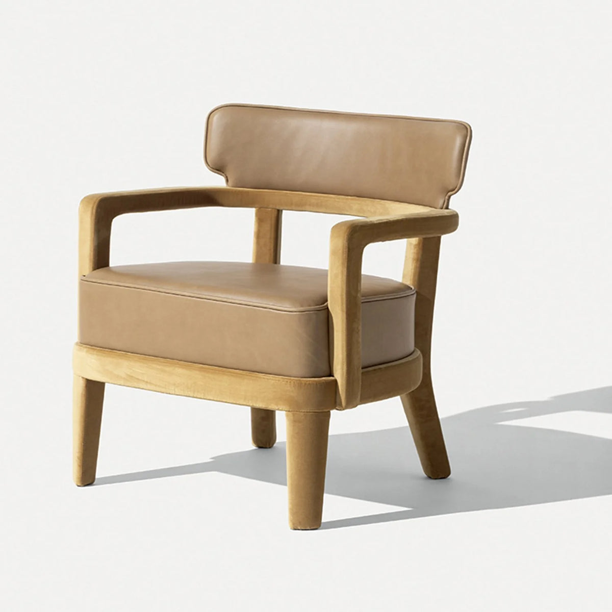 Zoe Armchair in tan leather, three-quarter view