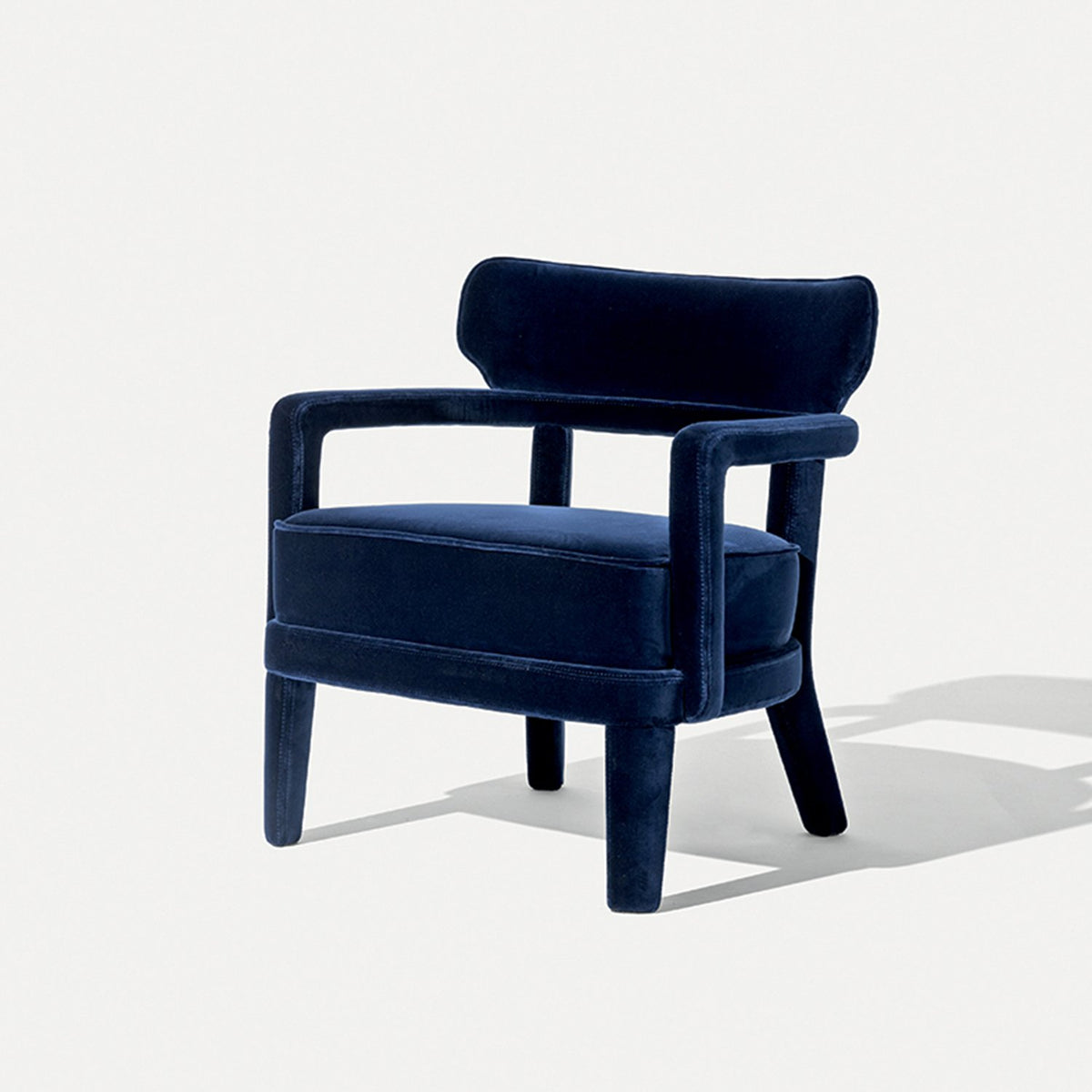 Zoe Armchair in navy velvet, three-quarter view