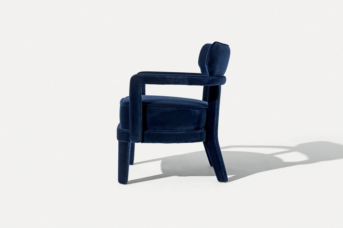 Zoe Armchair in navy velvet, side view
