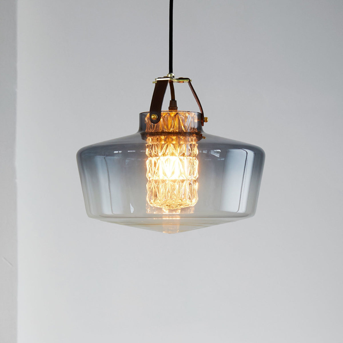 Addicted To Us pendant light in brass with smoked glass, styled interior by Maison Burgos