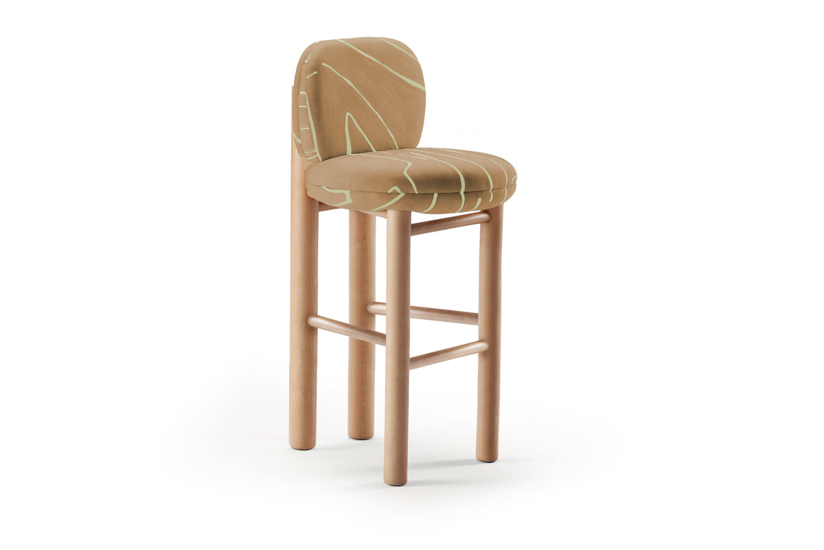 Aimi Counter Stool in mustard patterned fabric, front three-quarter on white