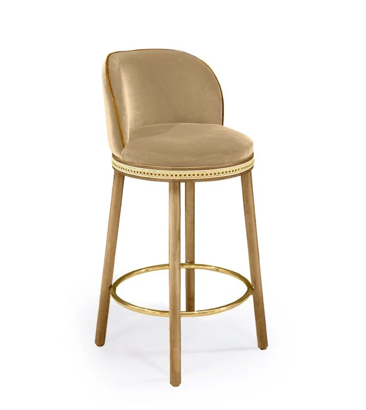 Alma Counter Stool in Dune velvet with natural oak legs and satin brass footrest