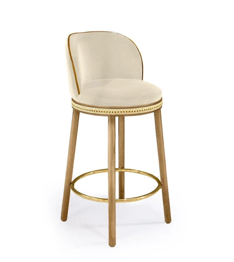 Alma Counter Stool in Nuage velvet with natural oak legs and satin brass footrest