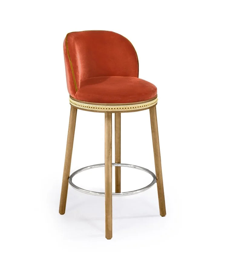 Alma Counter Stool in Papaye velvet with natural oak legs and polished nickel footrest
