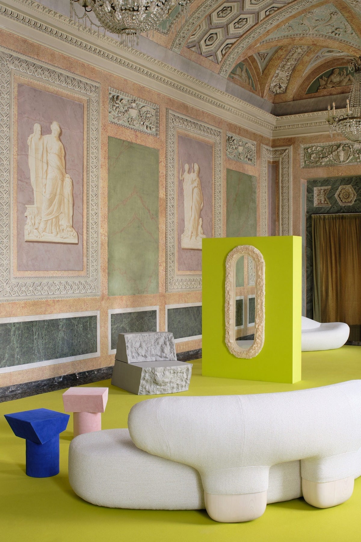 Asawa Sofa in a frescoed hall on a lime-green floor