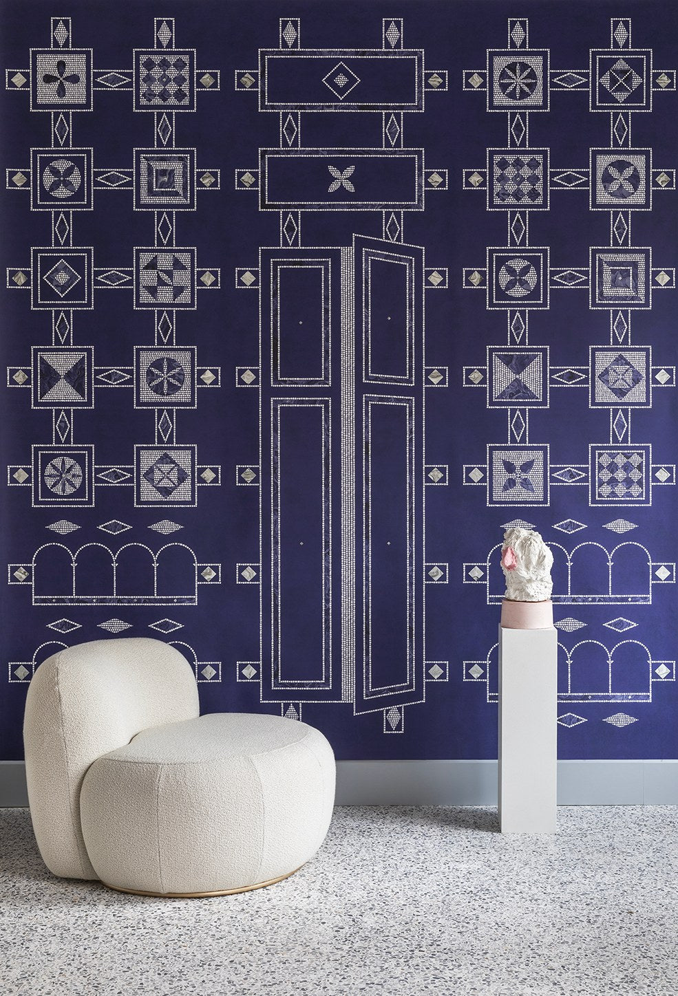 B-15 Z Lounge Chair in ivory bouclé against a navy and white patterned wall