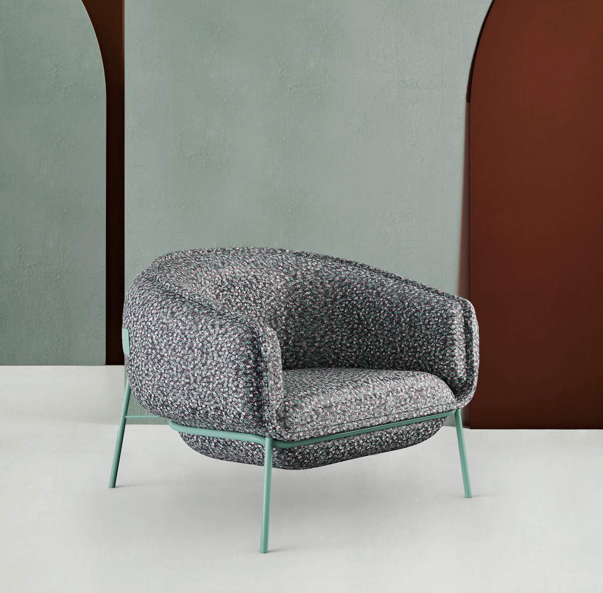 Blop Armchair in grey speckled bouclé with mint legs before a green wall
