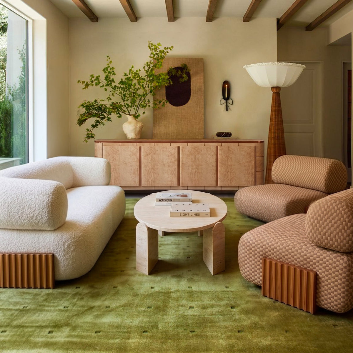 Carmel Chairs in pink check fabric in a living room with green rug and white sofa