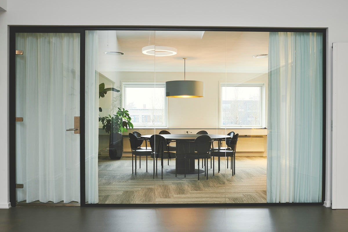 Casablanca Chairs with black frame in a meeting room by Maison Burgos