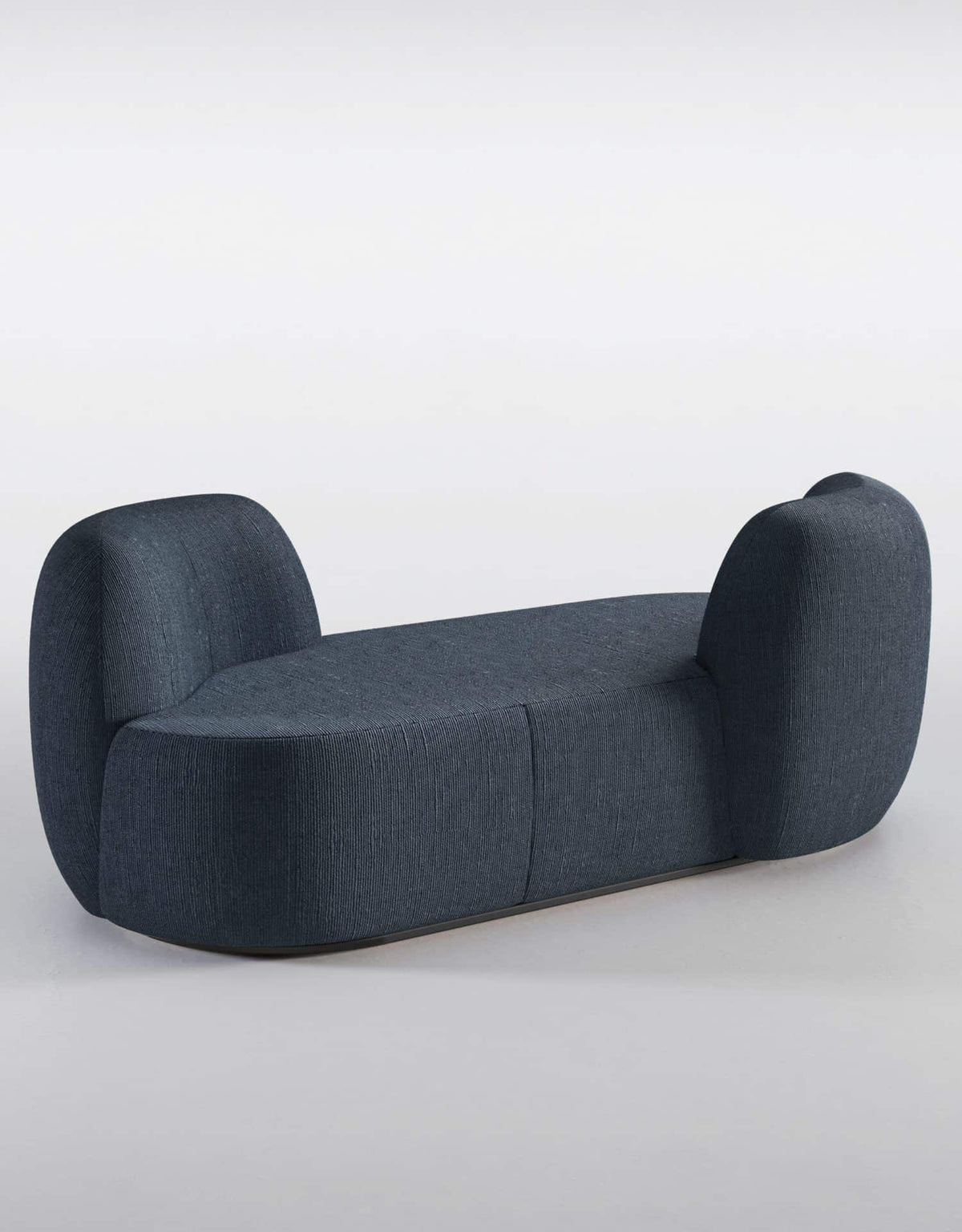 Chapter Two Sofa in navy bouclé, low rear three-quarter view