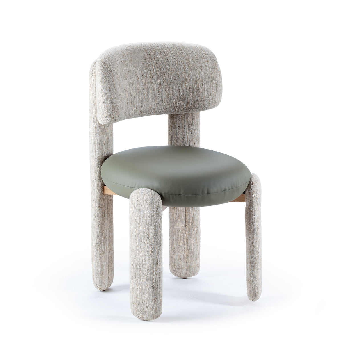 Choux Dining Chair in ivory textured weave with sage green seat, three-quarter view