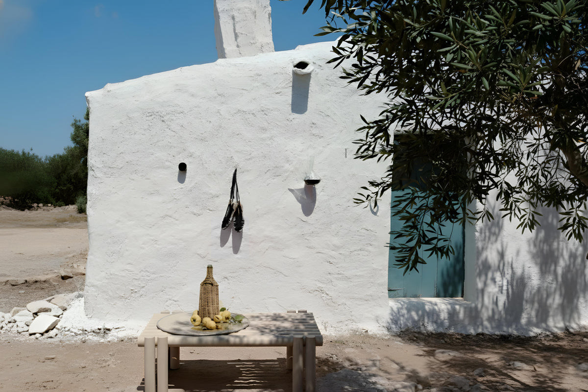 Duna Outdoor Centre Table in a garden setting by Maison Burgos