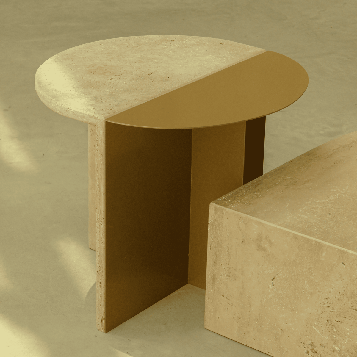 Duplex Side Table close-up of travertine and ochre Metal halves